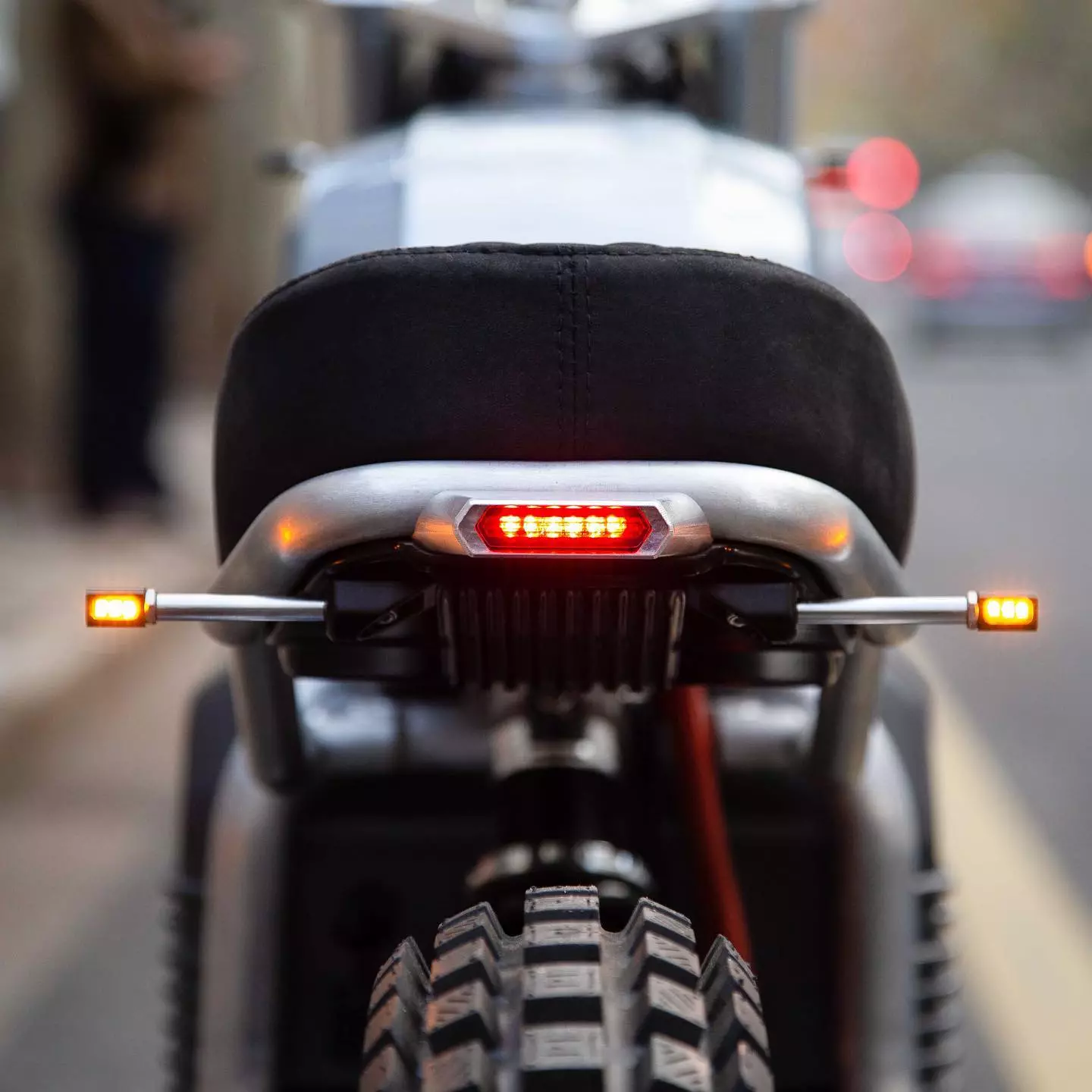The tail-light is integrated into the under-seat cooling tray