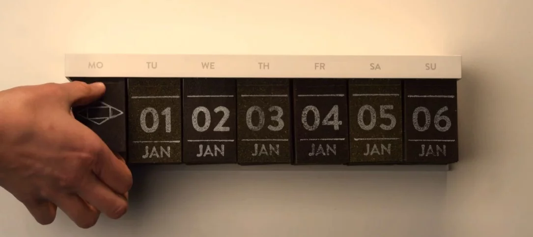 The Hälssen & Lyon tea calendar in its finished form and hanging on a wall