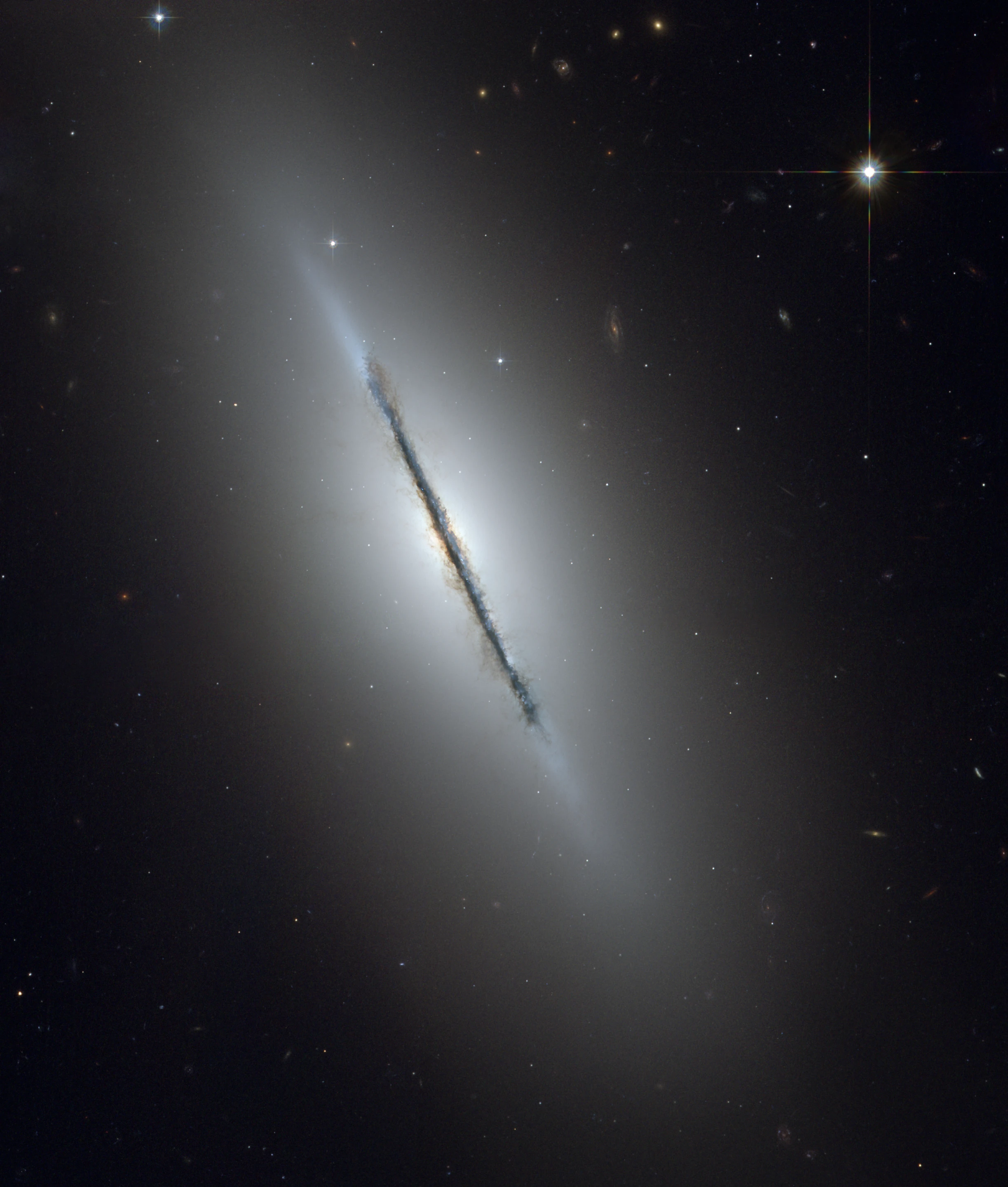 Hubble image of the Spindle galaxy (M102), imaged almost edge on from the telescope