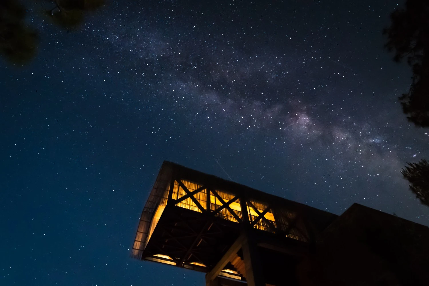 The Kumaon Hotel features a cantilevered dining room that juts out over the valley below