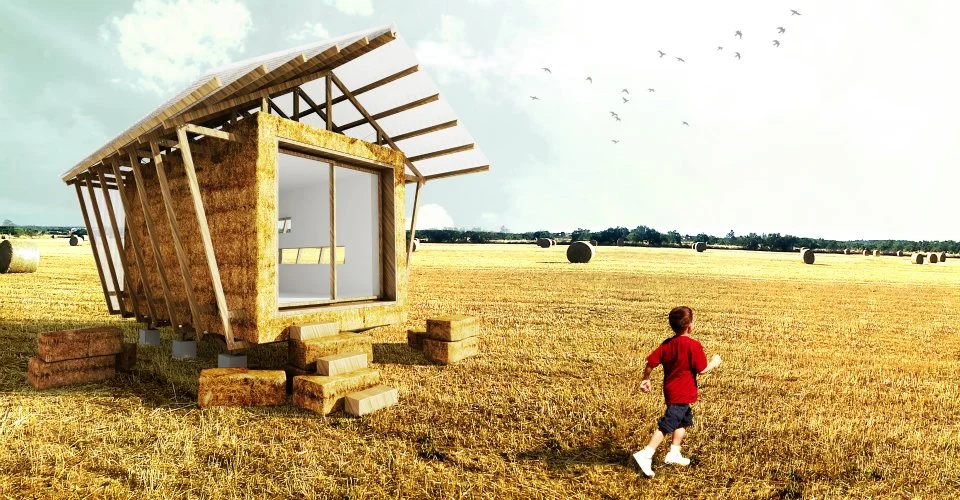 A large open glass window opens out onto the surrounding landscape