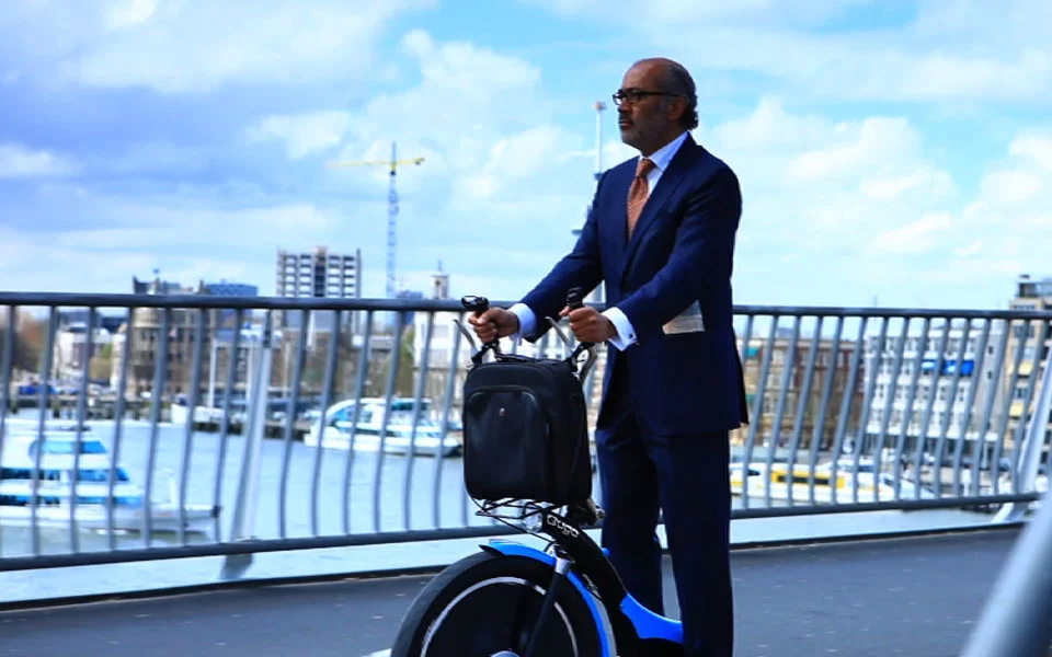 Qugo is a three-wheeled transporter with a top speed of 25 km/h (15.5 mph)