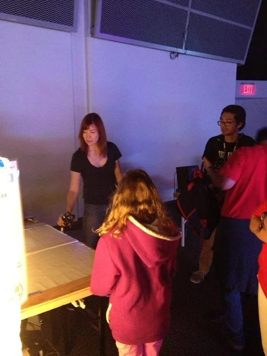 Jeri Ellsworth demonstrating the CastAR to a group at World Maker Faire 2013 (Photo: Technical Illusions)