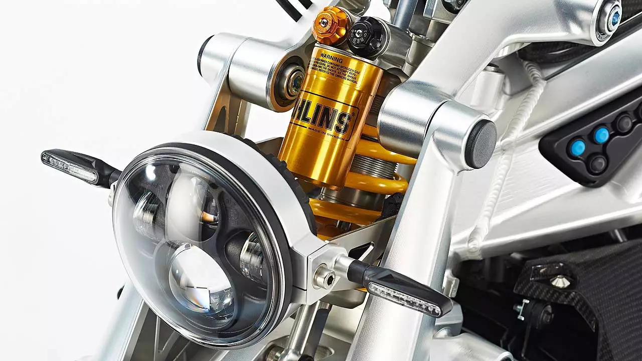 A single Ohlins shock is used with the single-shock girder fork system on the Ariel Ace