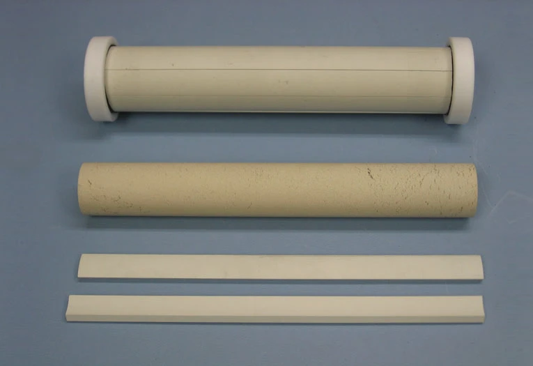 The plasmonic metamaterial cloak (top) and some of components used to make it (Photo: Andrea AlÃ¹)