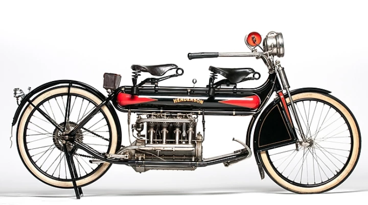 This ultra-rare first-year 1912 Henderson 4 is believed to be one of only six survivors. It’s an older restoration, and was purchased from Cape Town, South Africa in 1983. Remarkably, if you look closely, you'll see that the passenger is seated in front of the rider, between a long pair of ‘wheelbarrow’ handlebars.