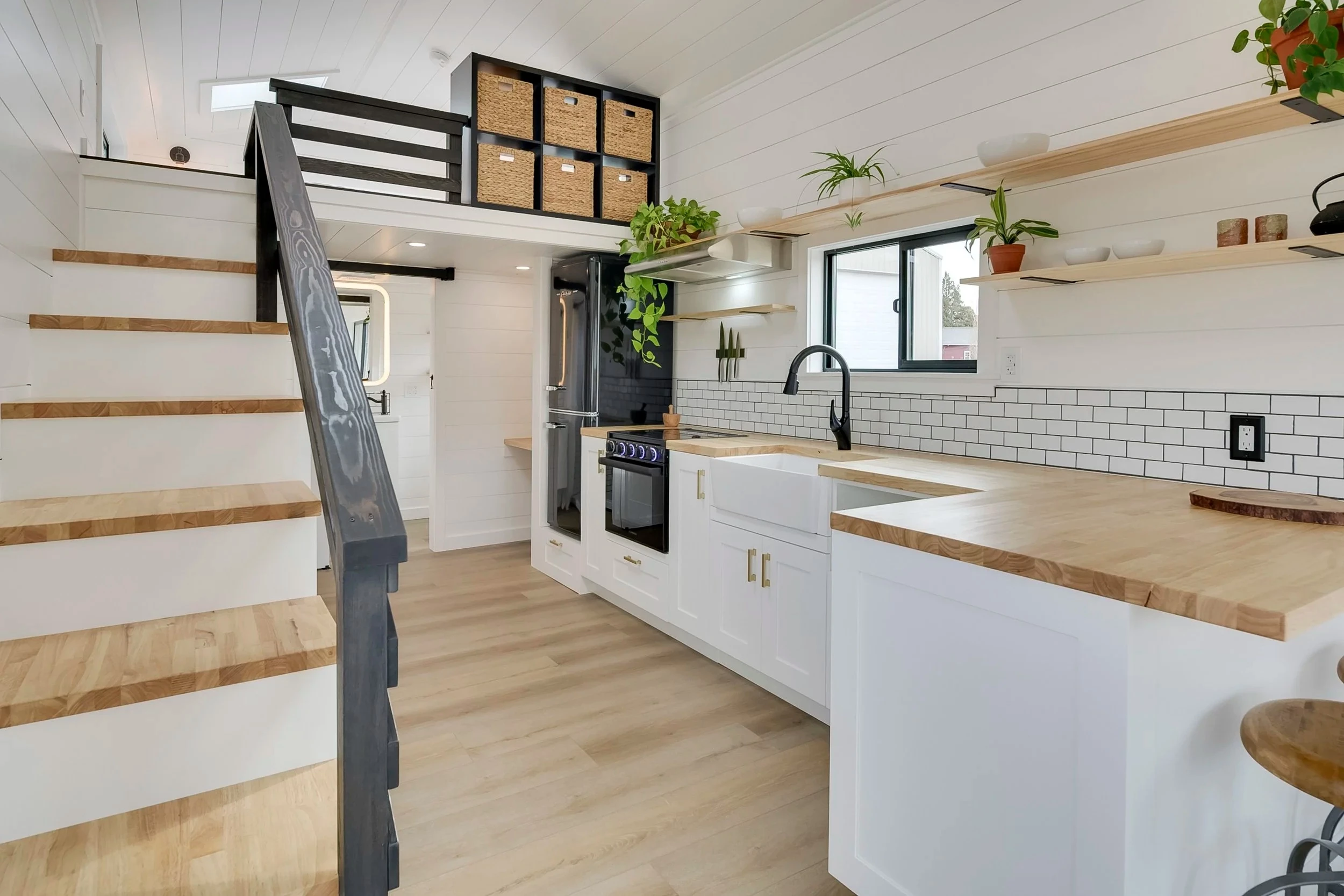 The Ochoco's loft bedroom includes some storage space, which also provides privacy from the rest of the home