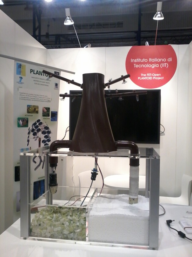 The robot on display, showing its tentacle-like and "growing" roots (bottom left and right, respectively)