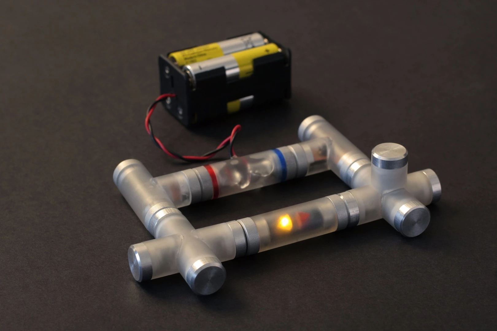 An external battery pack powers a simple circuit