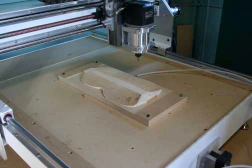 Photograph of the CNC machine carving the back of the Stradivari Betts violin reproduction. (Photo: RSNA)