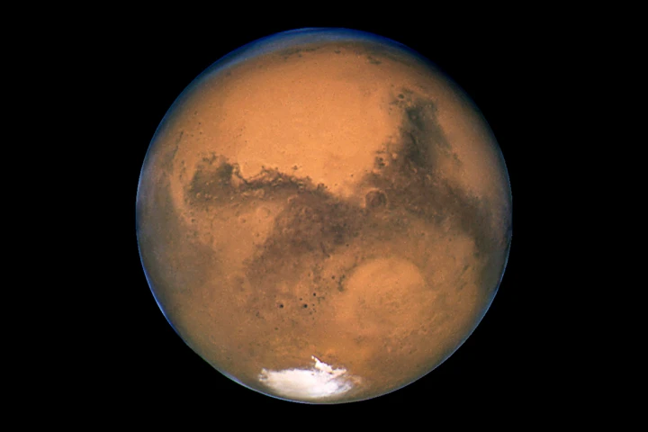 Mars could house photosynthesizing microbes within a specific habitable zone, according to a new study from Caltech