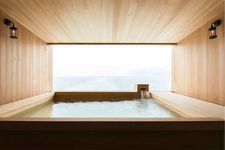 Relaxing hot tub overlooks the Seto Inland Sea, Japan