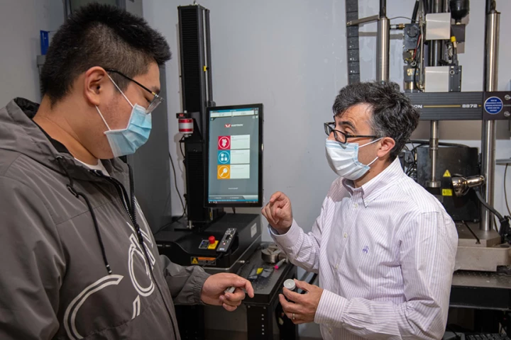 Prof. Rahbar (R) and his team have developed self-healing concrete using an enzyme found in red blood cells