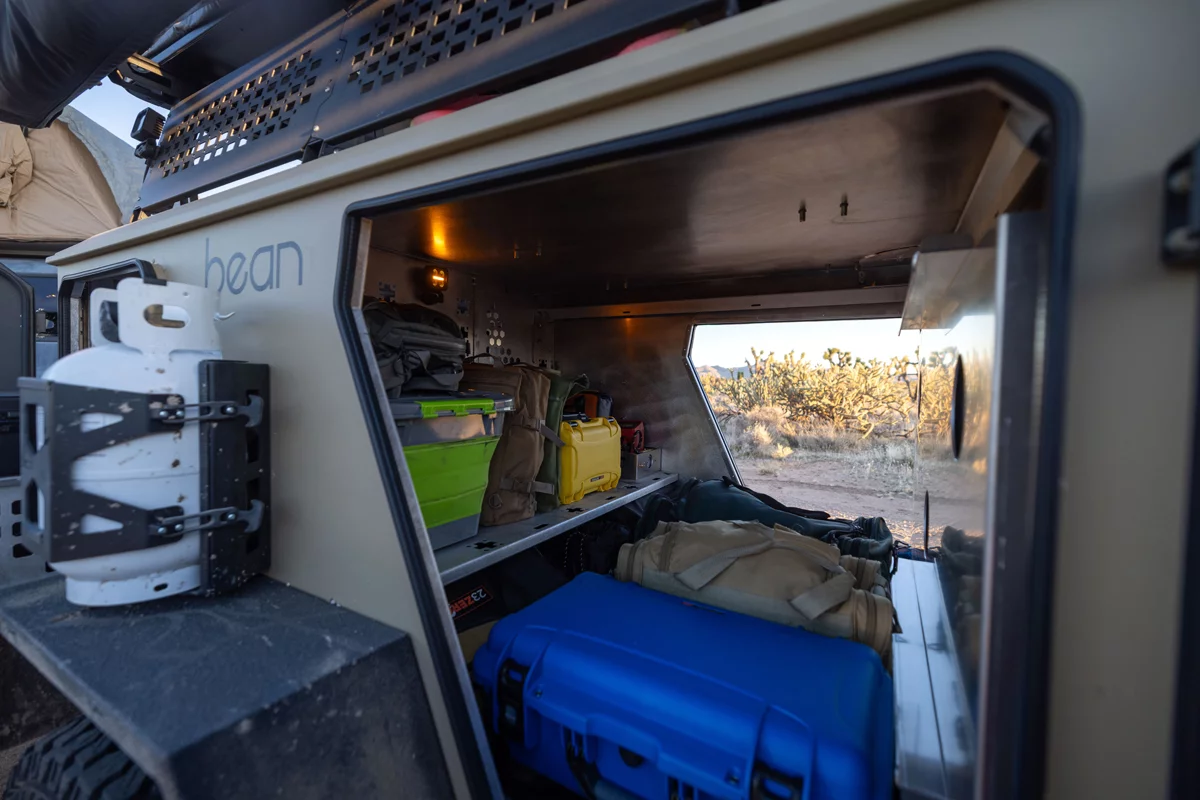 Like a dual-door squaredrop trailer, only with gear organization in place of a mattress
