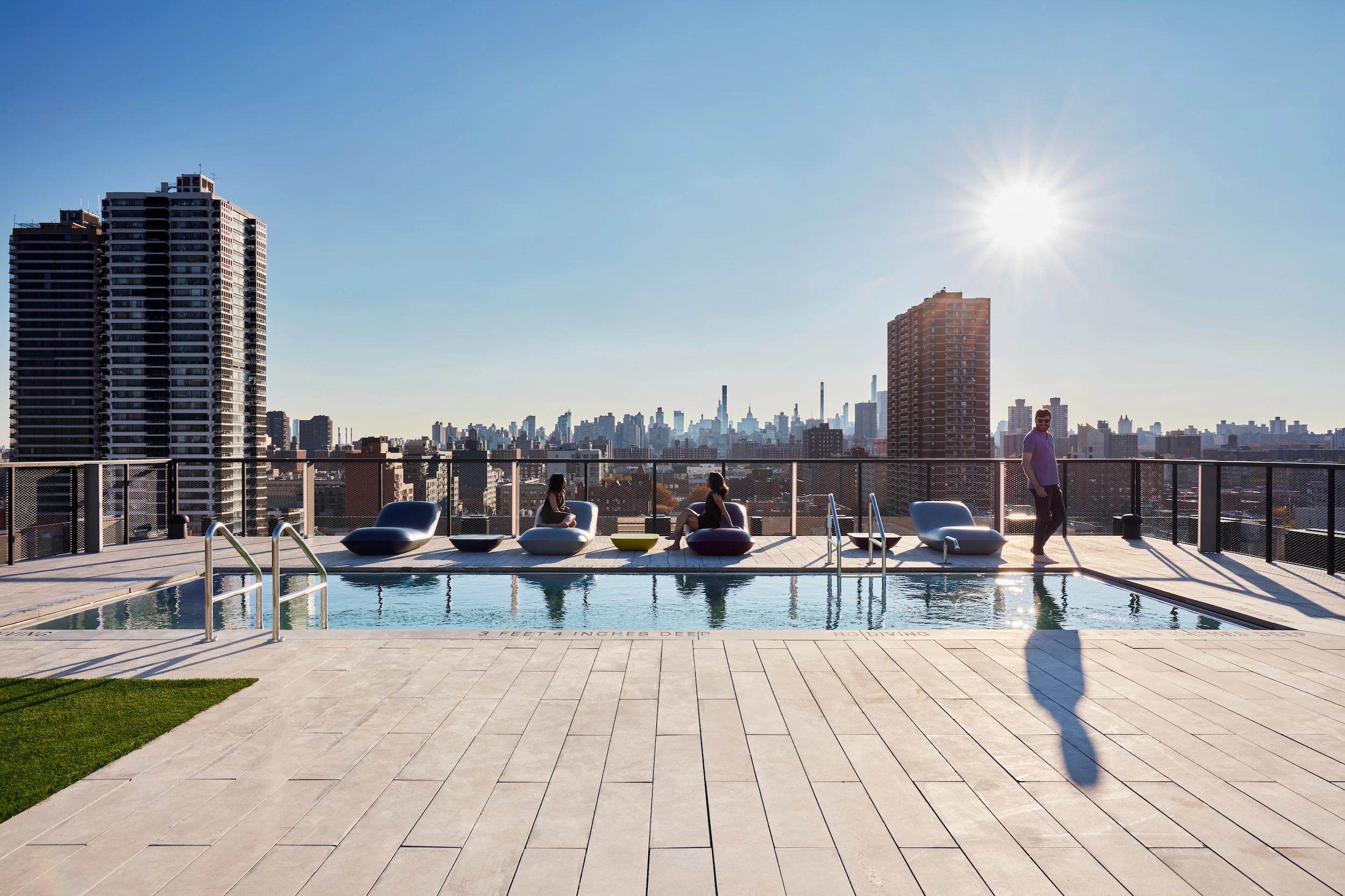 The Smile's rooftop terrace area includes one swimming pool and three hot tubs for residents to enjoy