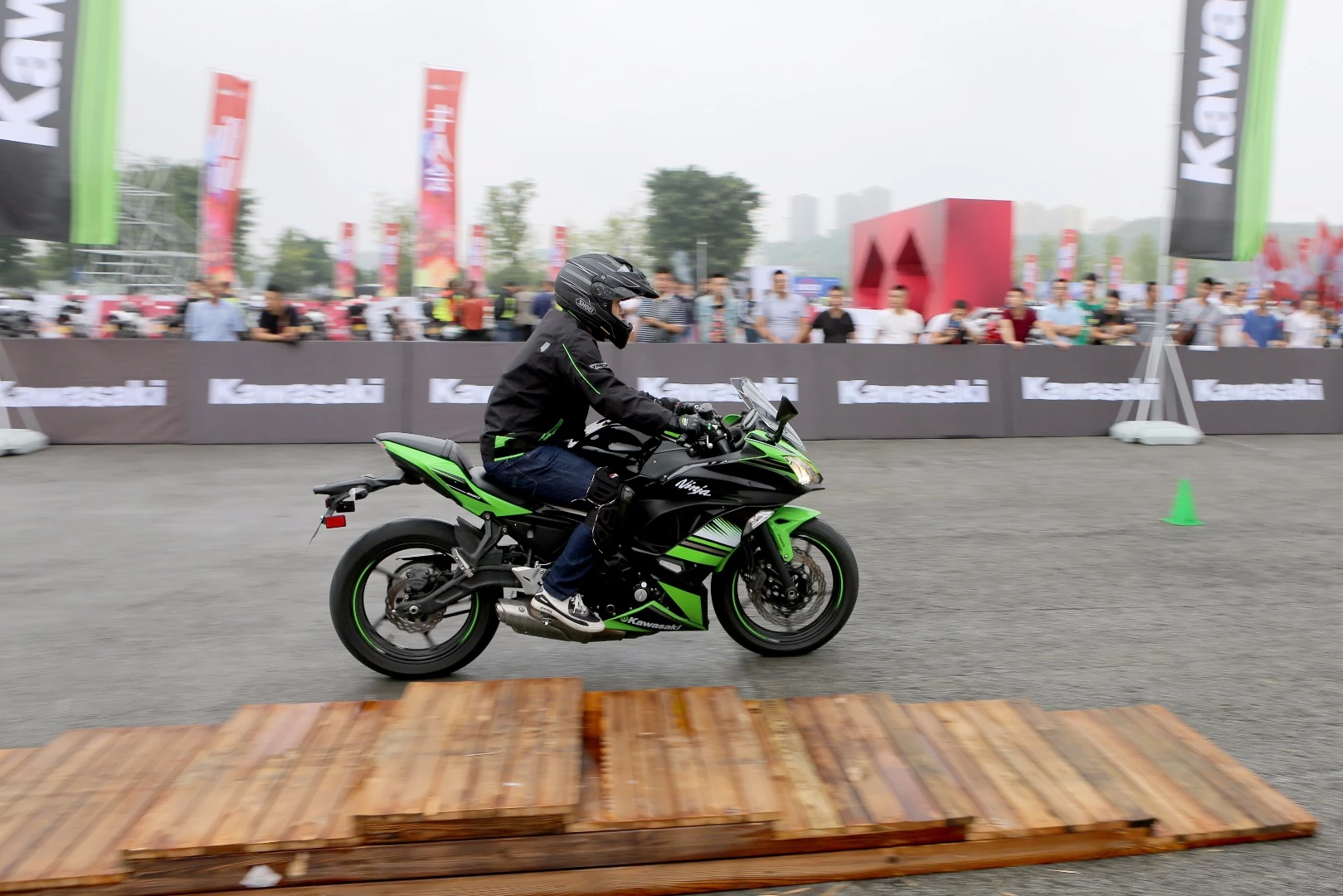 Massive display and riding areas surrounded the Qongqing International Expo Centre and Kawasaki was the most prominent of the brands demonstrating its machinery and allowing showgoers to try the bikes