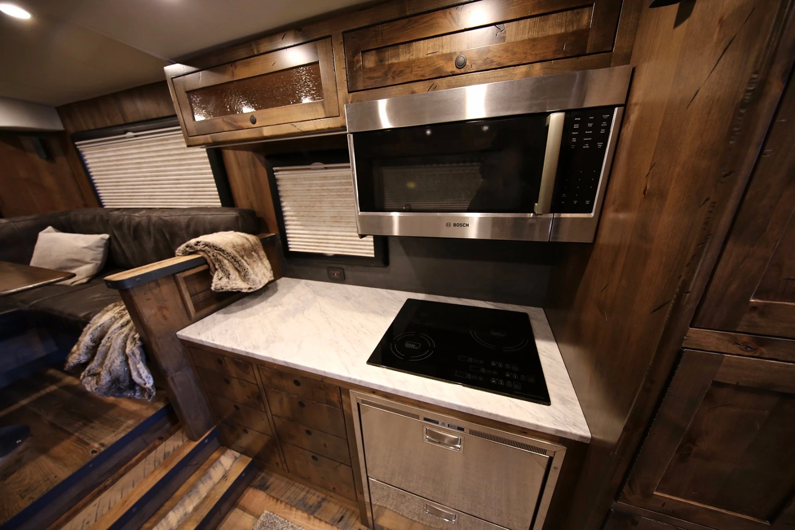 EarthRoamer's XV-HD is built more like a tank outside but looks like a ski chalet inside