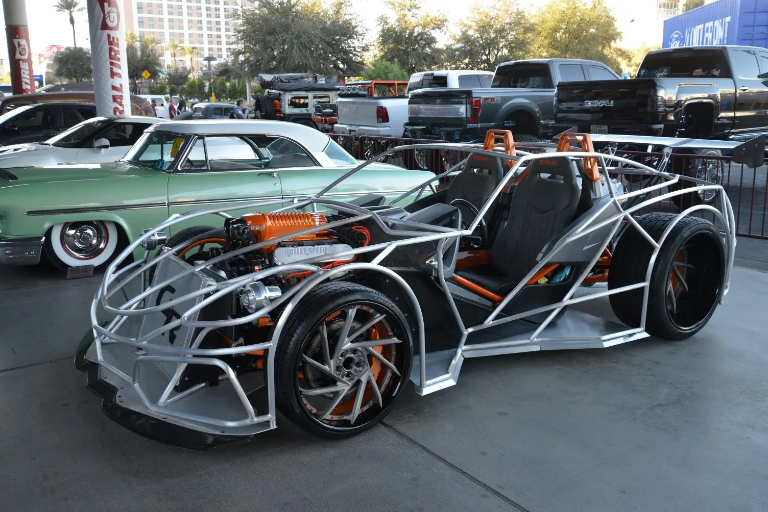 A rather skeletal Polaris Slingshot with four-wheel conversion kit