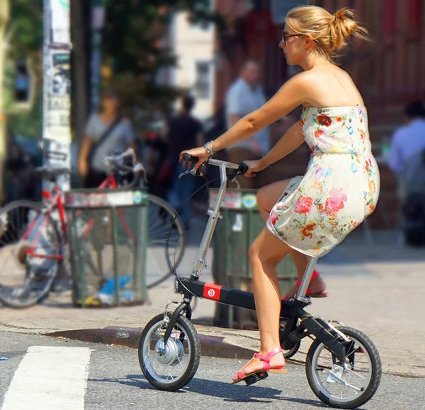 The CMYK 4.0 smart folding e-bike's motor assists pedaling for up to 30 miles (48 km) per charge