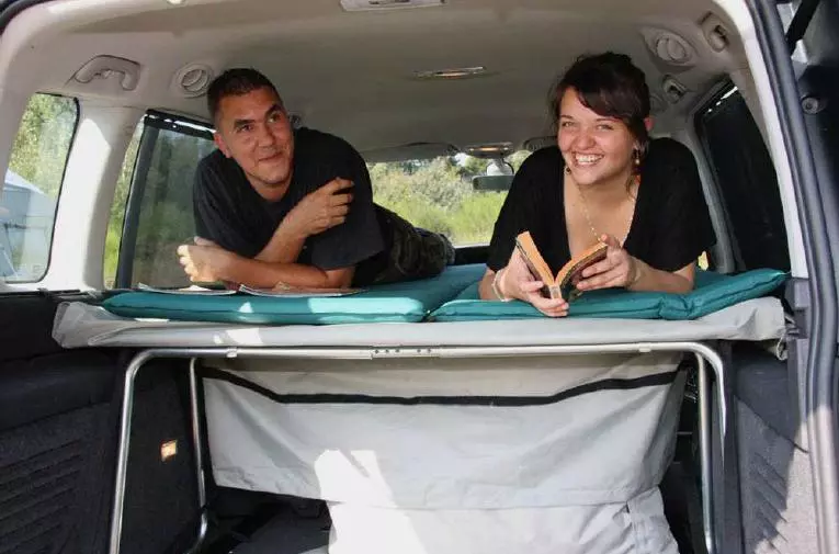 Two adults can sleep in the cabin of the car