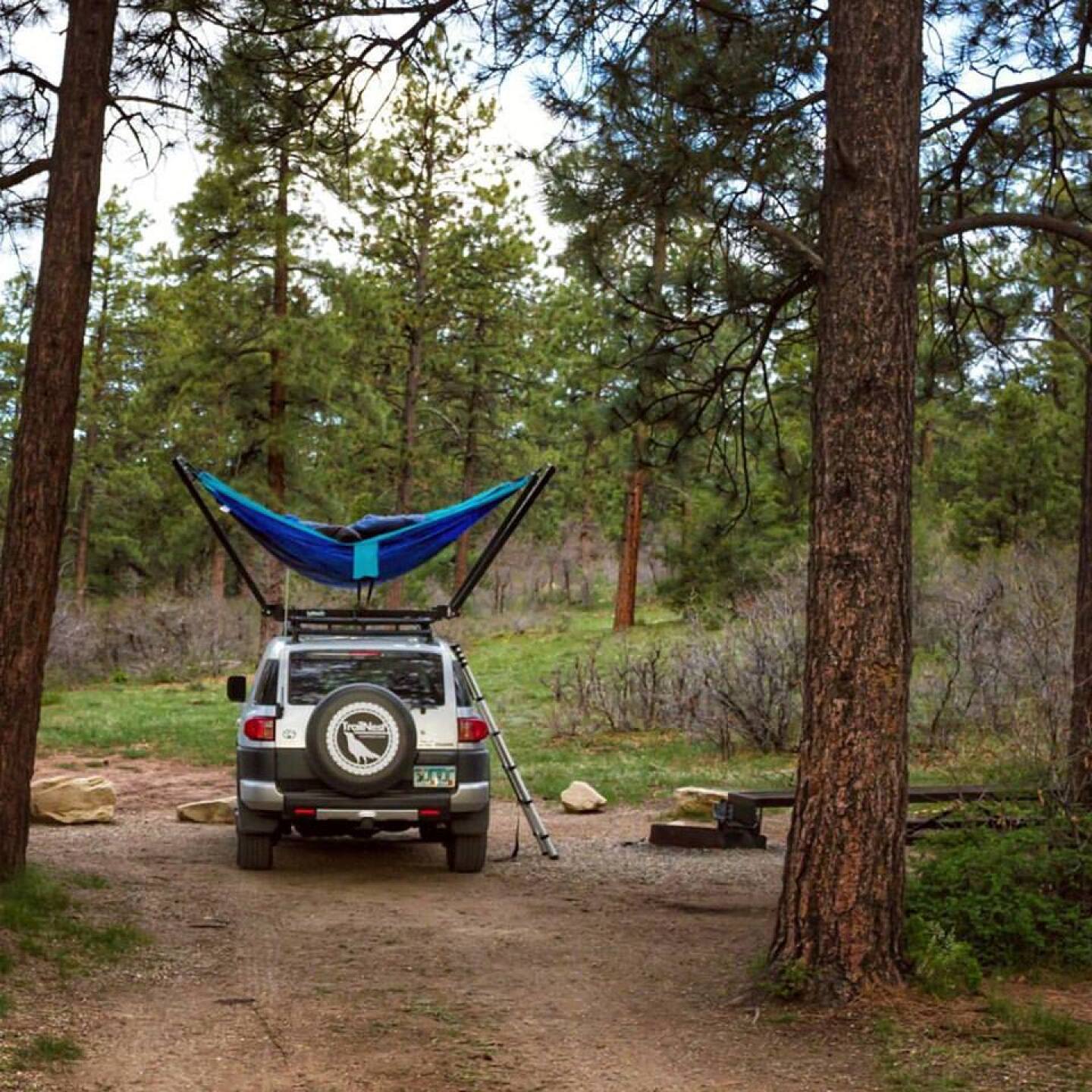 TrailNest elevates hammocks to the car roof top
