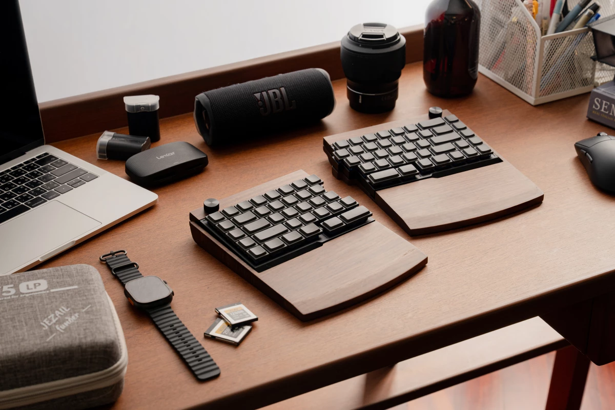 The Jiffy 75 split keyboard can be used either connected together or separated, with optional solid wood wrist rests designed to support a more natural typing posture