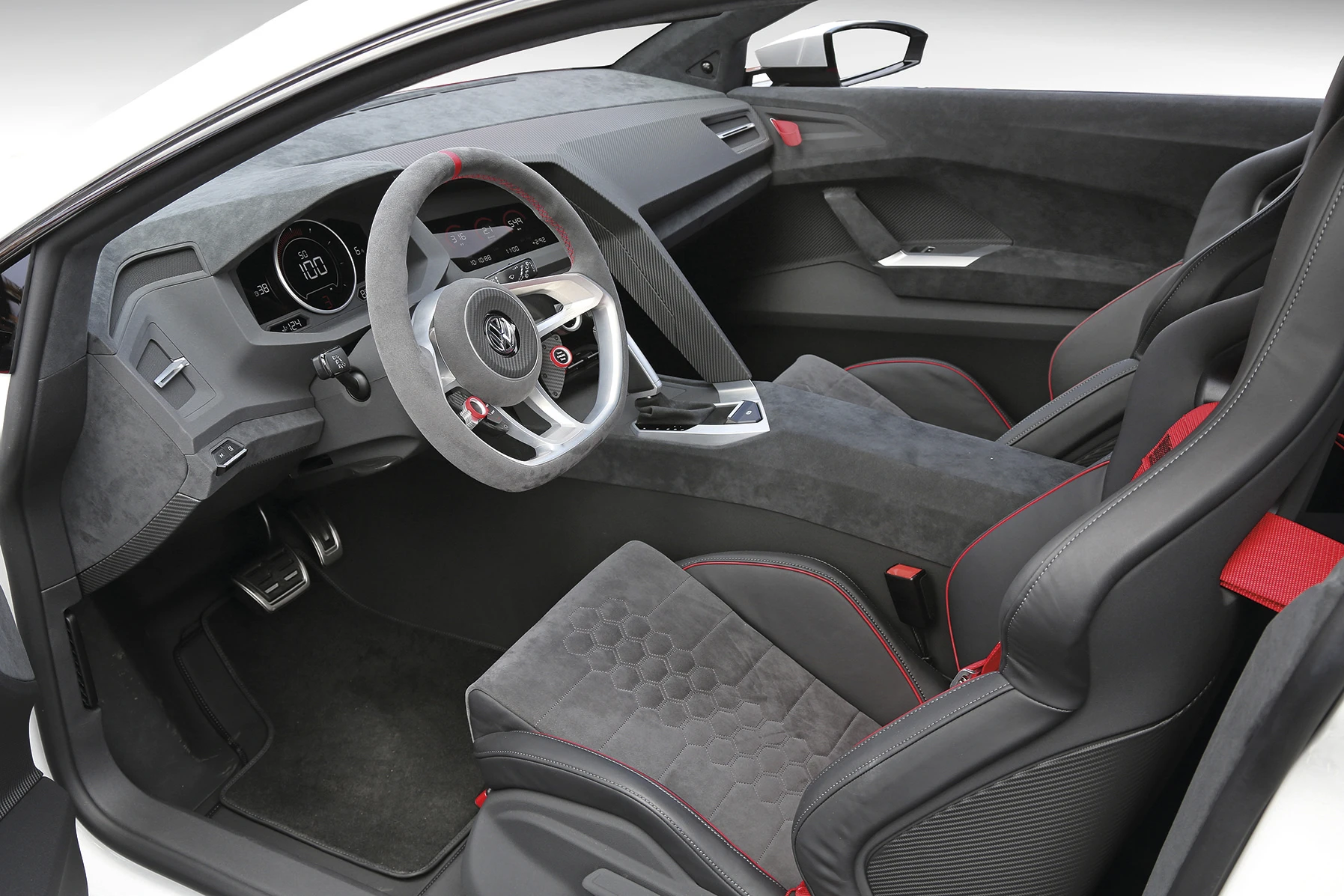 The special steering wheel, racetrack display and bits of carbon fiber, Anthracite, Alcantara and red/black Nappa leather are part of the concept package