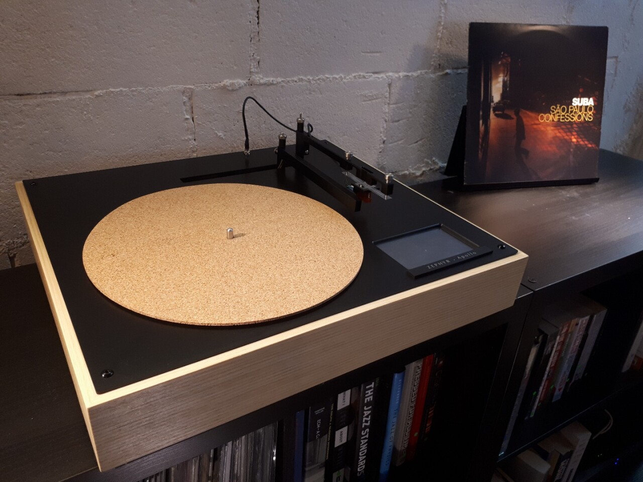 The Zephyr Apollo turntable will come in maple or walnut finish