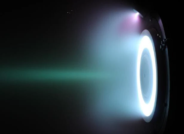 When running on a xenon propellant, the engine plume is a bright blue color