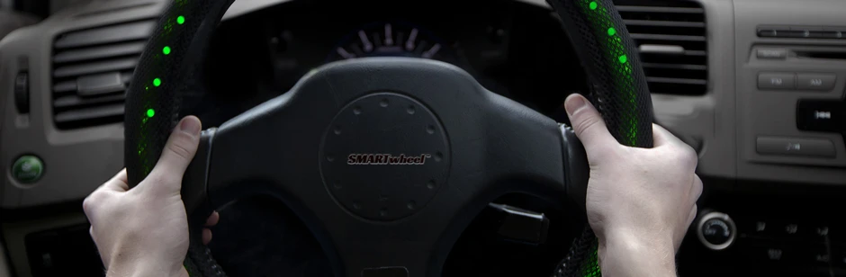 SMARTwheel sounds an alert when a driver is detected holding the steering wheel in an unsafe way