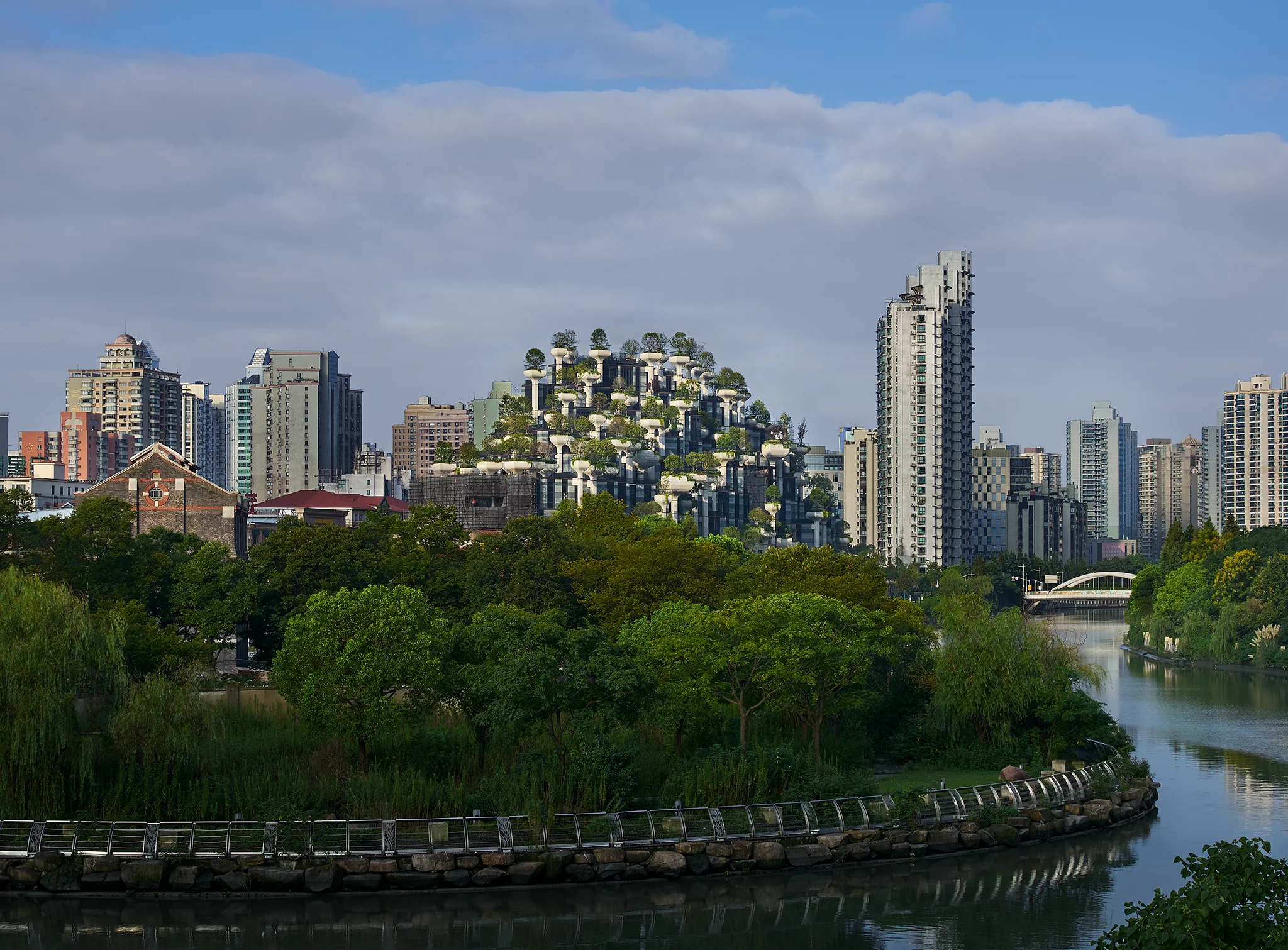 The first phase of 1000 Trees is now complete, while a second tree-covered building nearby is currently under construction