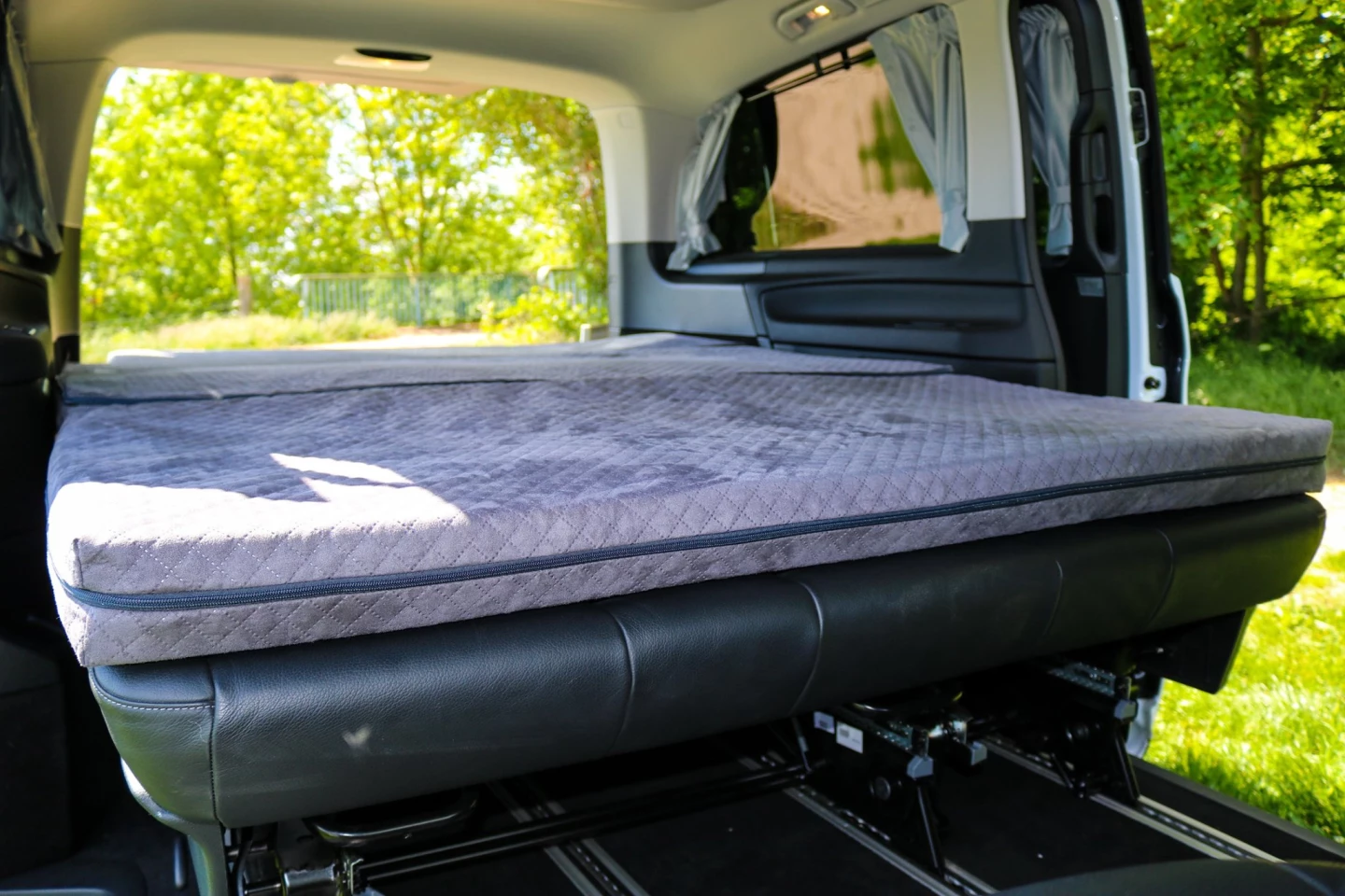 The mattress folds out to a 79 x 55-in sleeping space for two