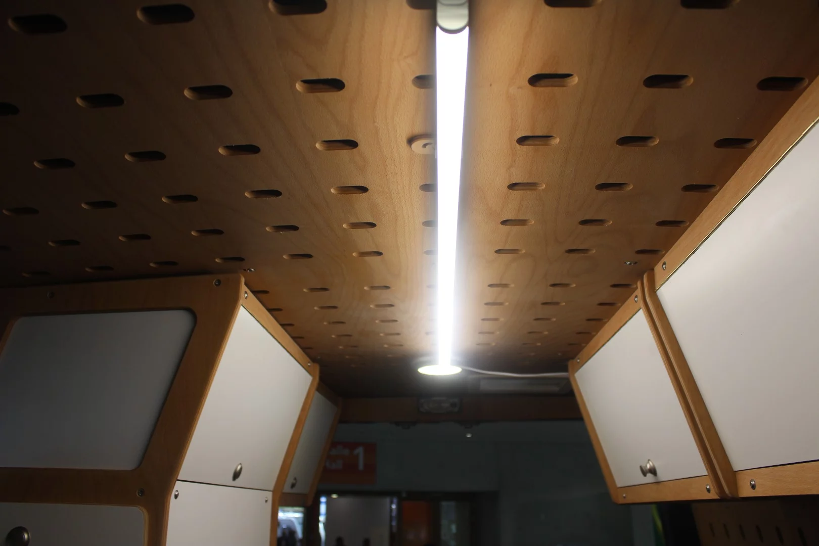 Lighting mounted up to the Cargo Clip ceiling panel