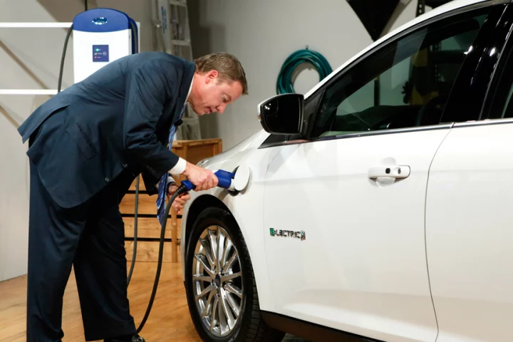 Ford Motor Company, Executive Chairman Bill Ford charges the Ford Focus Electric using the home charging station