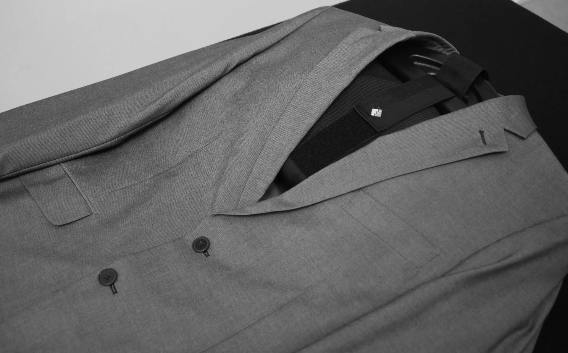 The Freefold commuter travel system is said to maintain the shape of a business suit jacket, tie, shirt and trousers