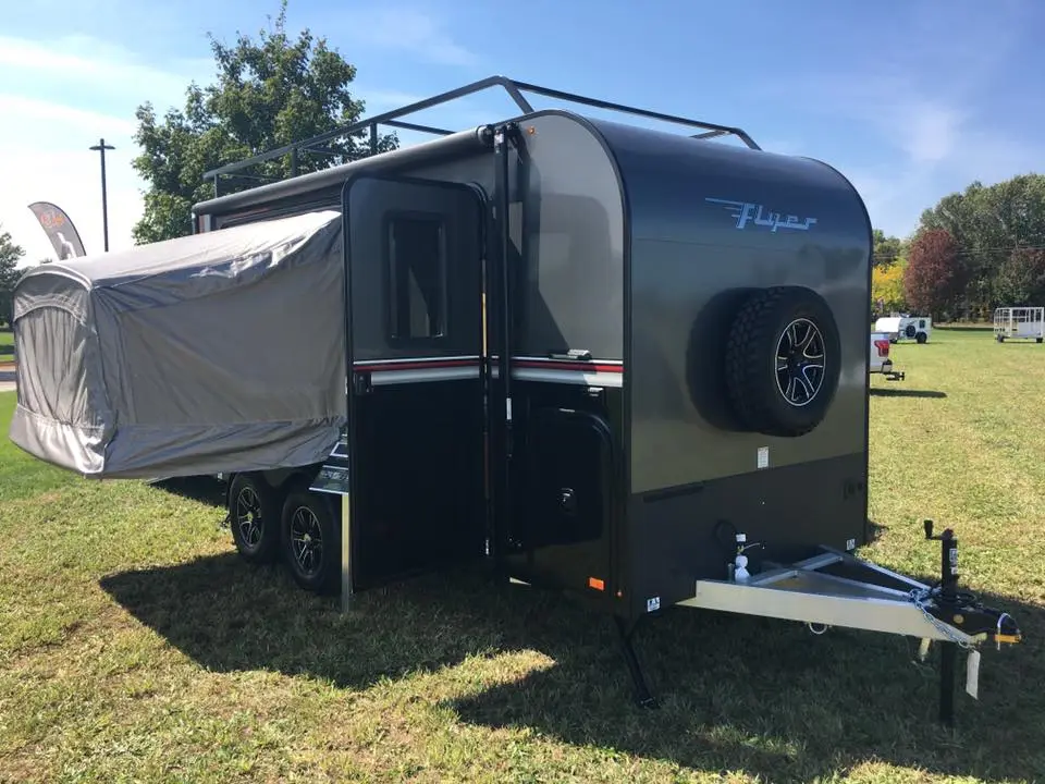 Luna offers side tip-out beds for its Explore Flyer trailer, turning a rugged toy hauler into a camping trailer