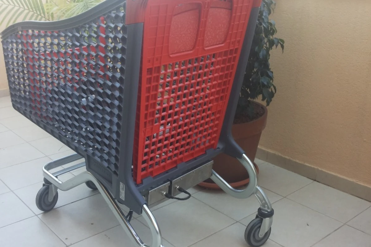 The final version of Hay's electrical super trolley, a supermarket shopping cart that has a motor on it to assist in pushing heavy loads