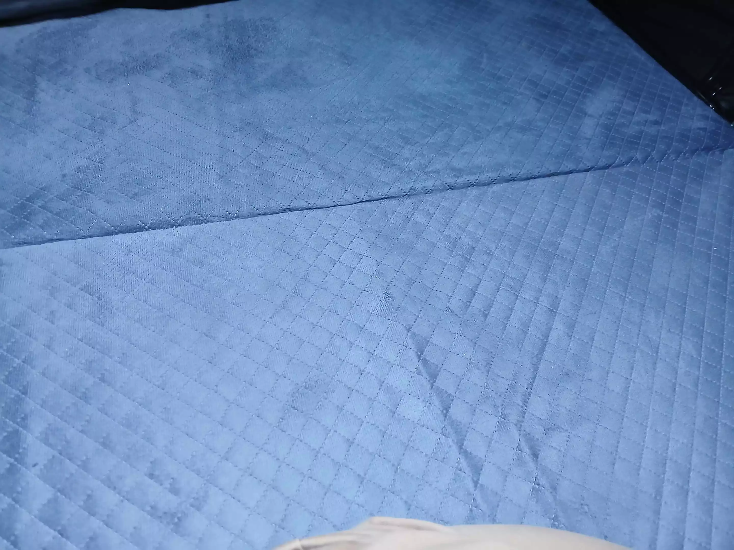 The mattress features nice soft top fabric but is too thin and hard for real comfort