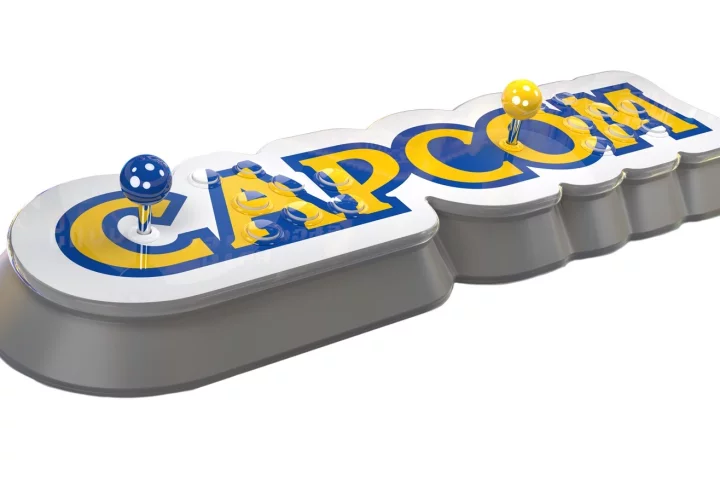 The Capcom Home Arcade is a retro console shaped like the company logo, with two sets of controls on one long panel