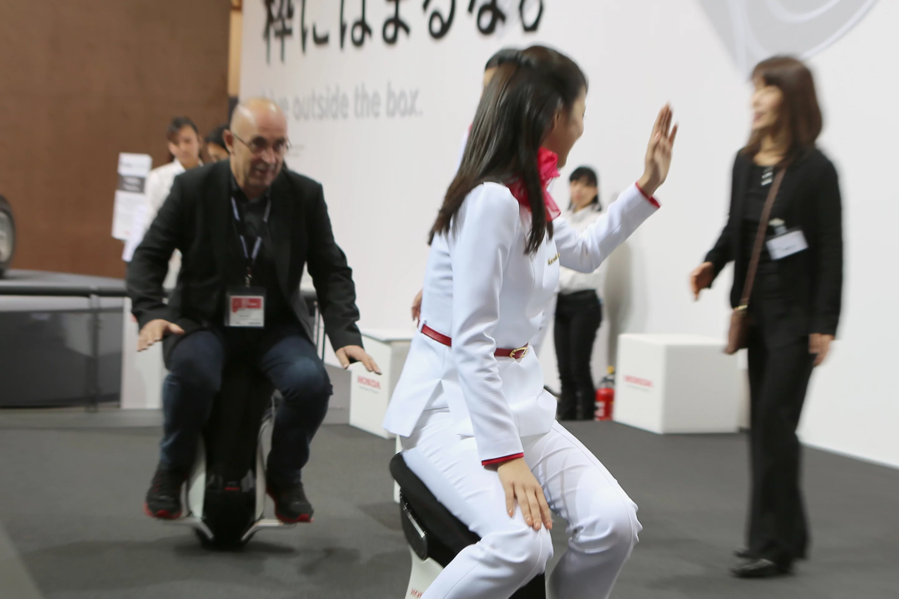 Riding Honda's UNI-CUB β (Photo: Stephen Clemenger / Lets C Design)