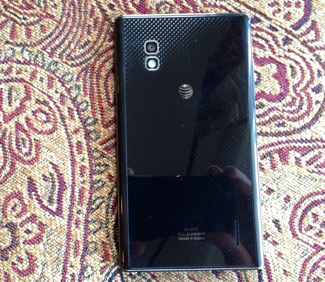 The glass back reflects a glittery, "Nexus One live wallpaper" look