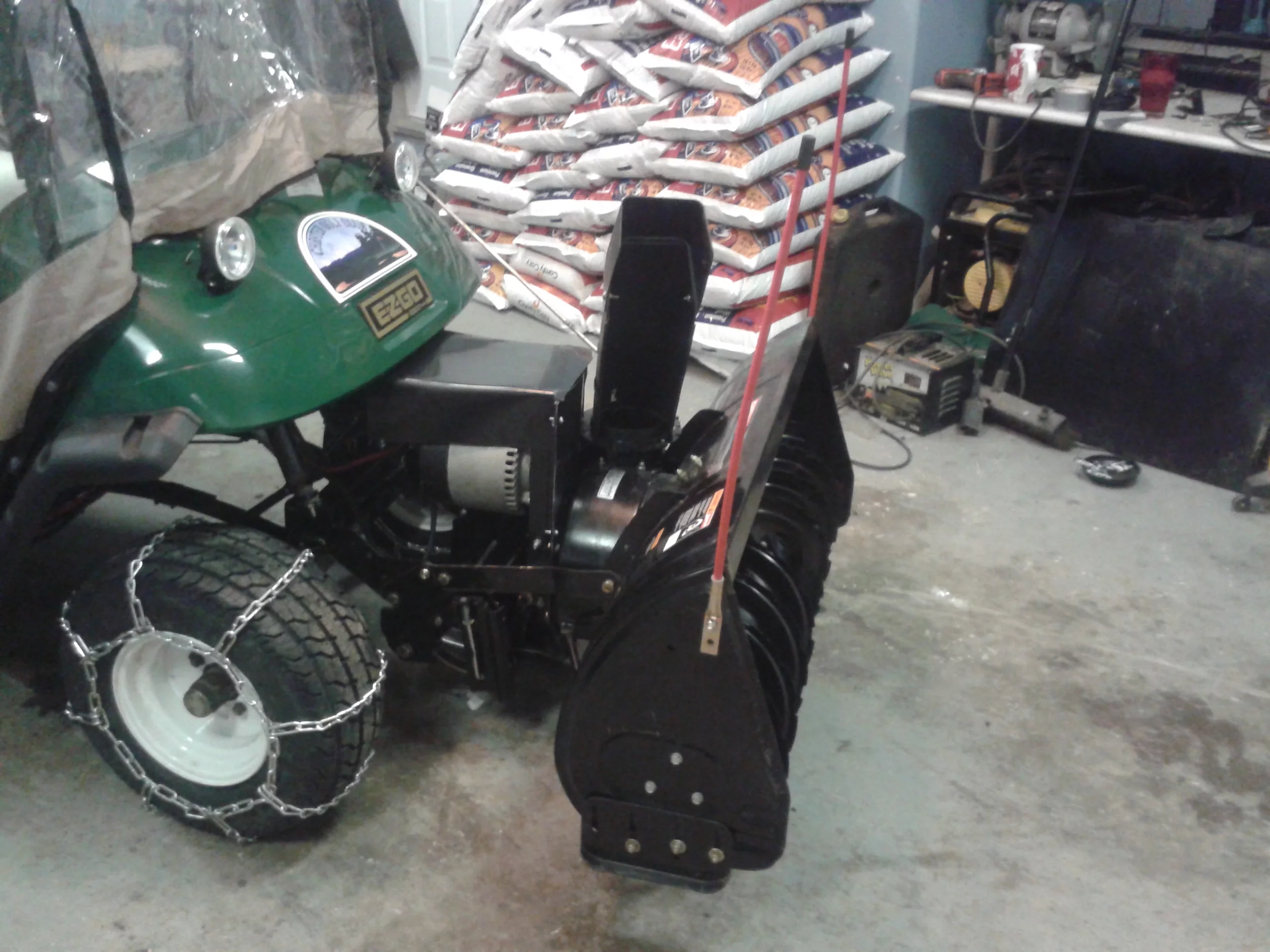 Snowpig blower motor and tire chains