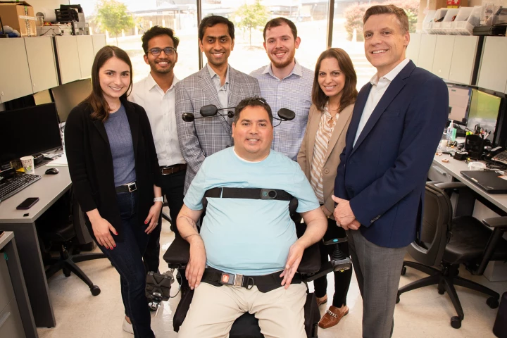Using a first-of-its-kind 'double neural bypass technology,' researchers have restored arm movement and sensation to quadriplegic Keith Thomas