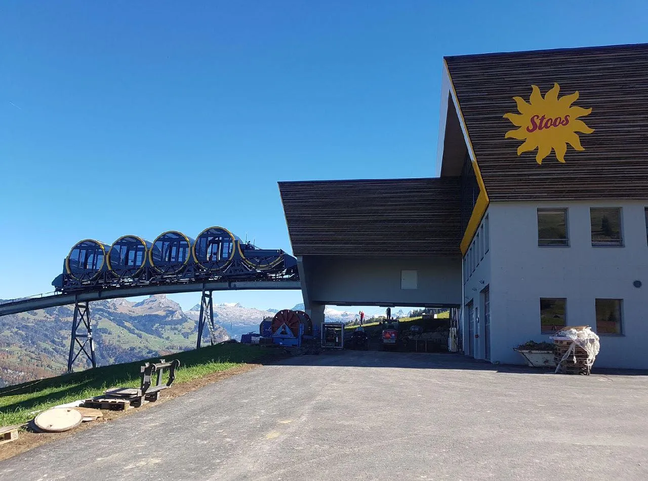 The Stoosbahn funicular railway in Switzerland, which starts at an altitude of 562 m and ends at 1,306 m, includes traveling through three tunnels and across more than 500 m (1,640 ft) of bridge
