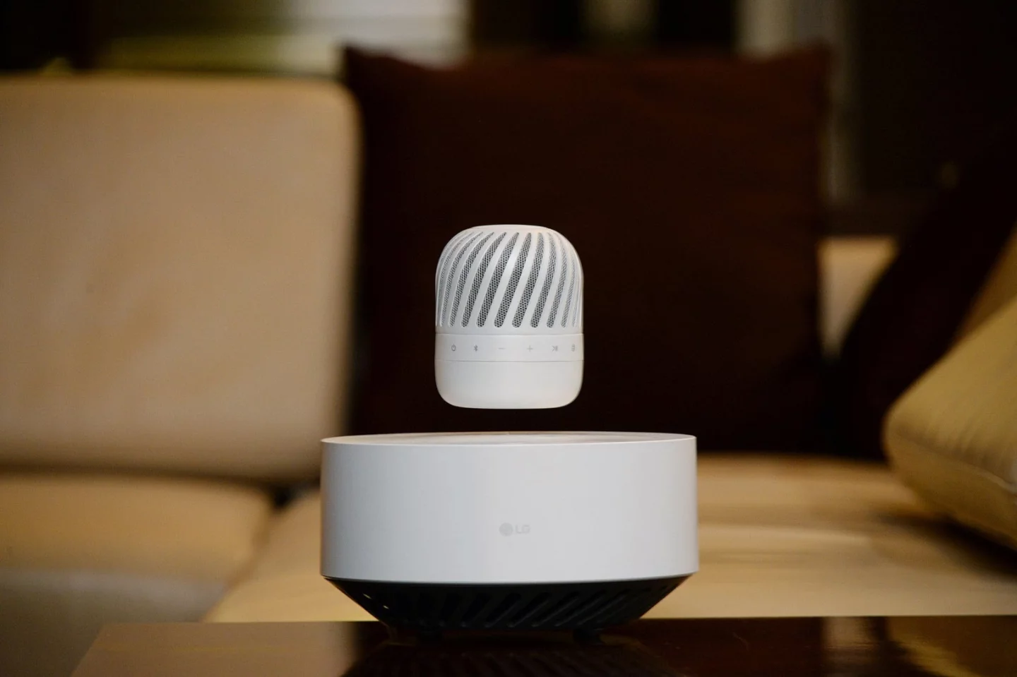 When the PJ9's battery begins to get low, the floating part of the speaker system will automatically descend to the base station and begin to charge wirelessly, without needing to stop music playback