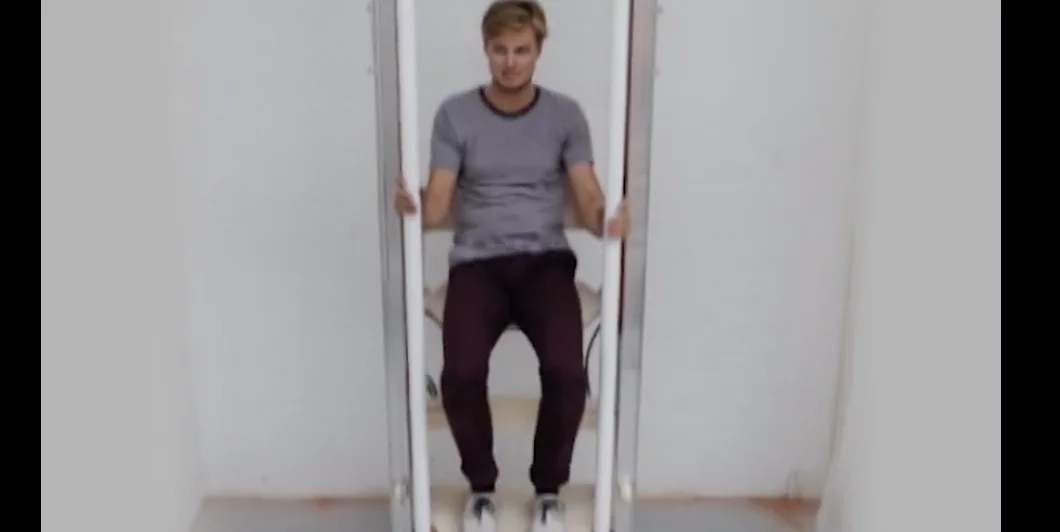 Rombaout Labs Vertical Walking device uses a system of upright rails, pulleys and a gripping system to allow a user to move between floors