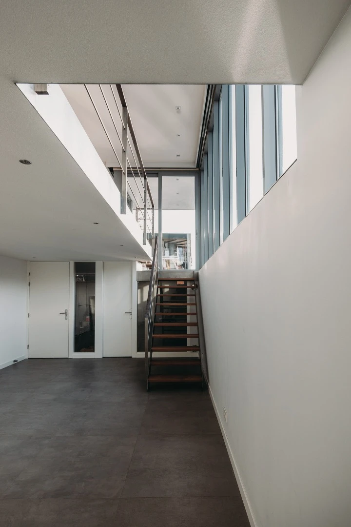 Stairs leading to the lower level of the home