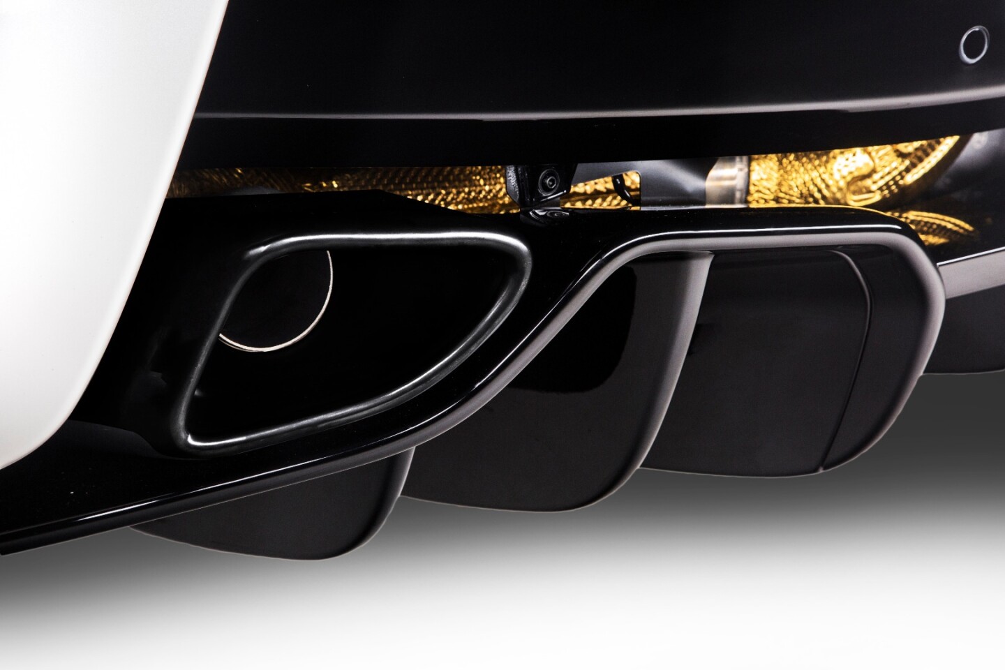 The titanium exhaust system of the McLaren 570GT Concept is described as having its own unique sound