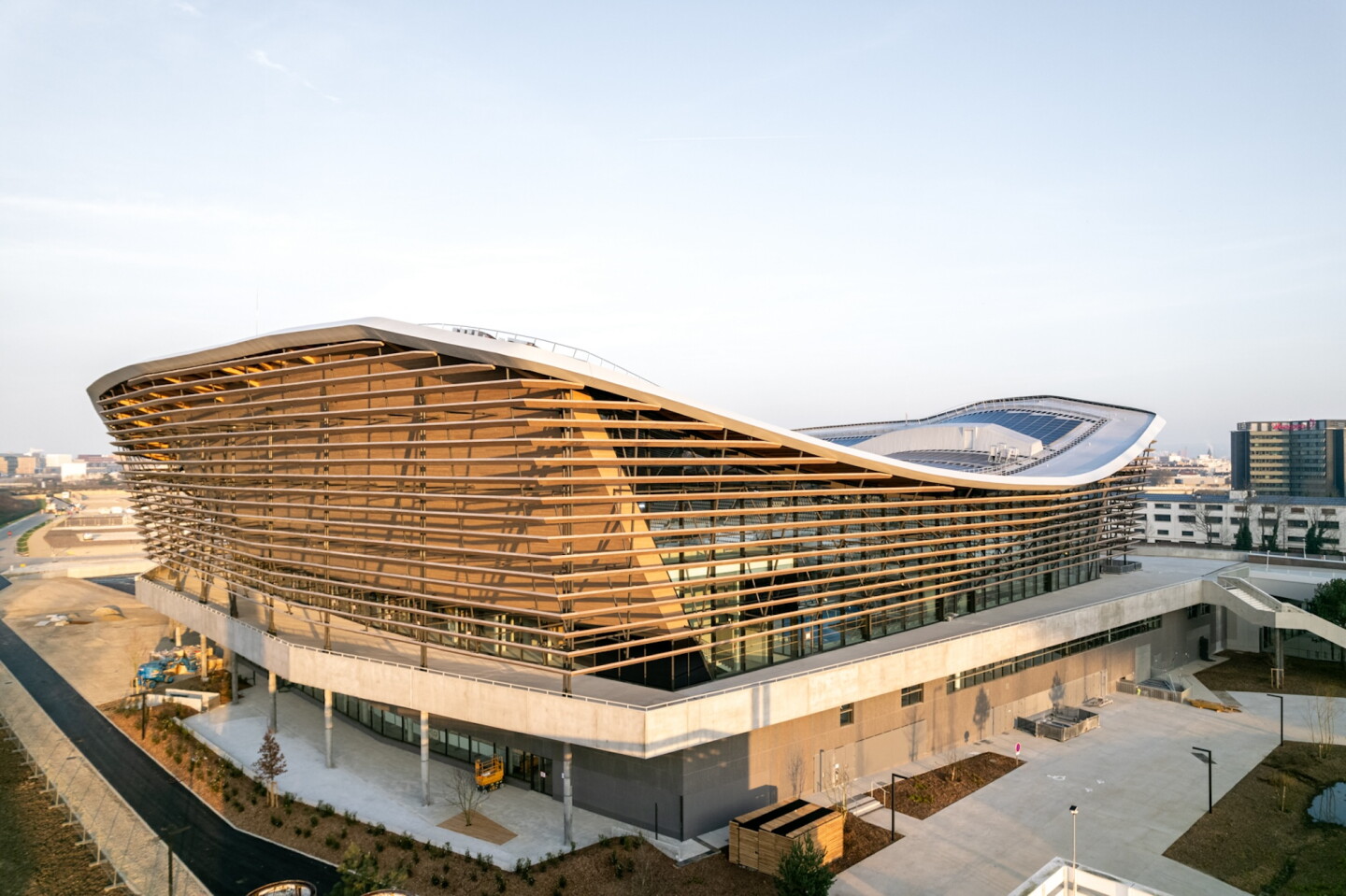 The Aquatics Centre Paris 2024 is topped by a rooftop solar panel array that is the largest urban solar farm in France
