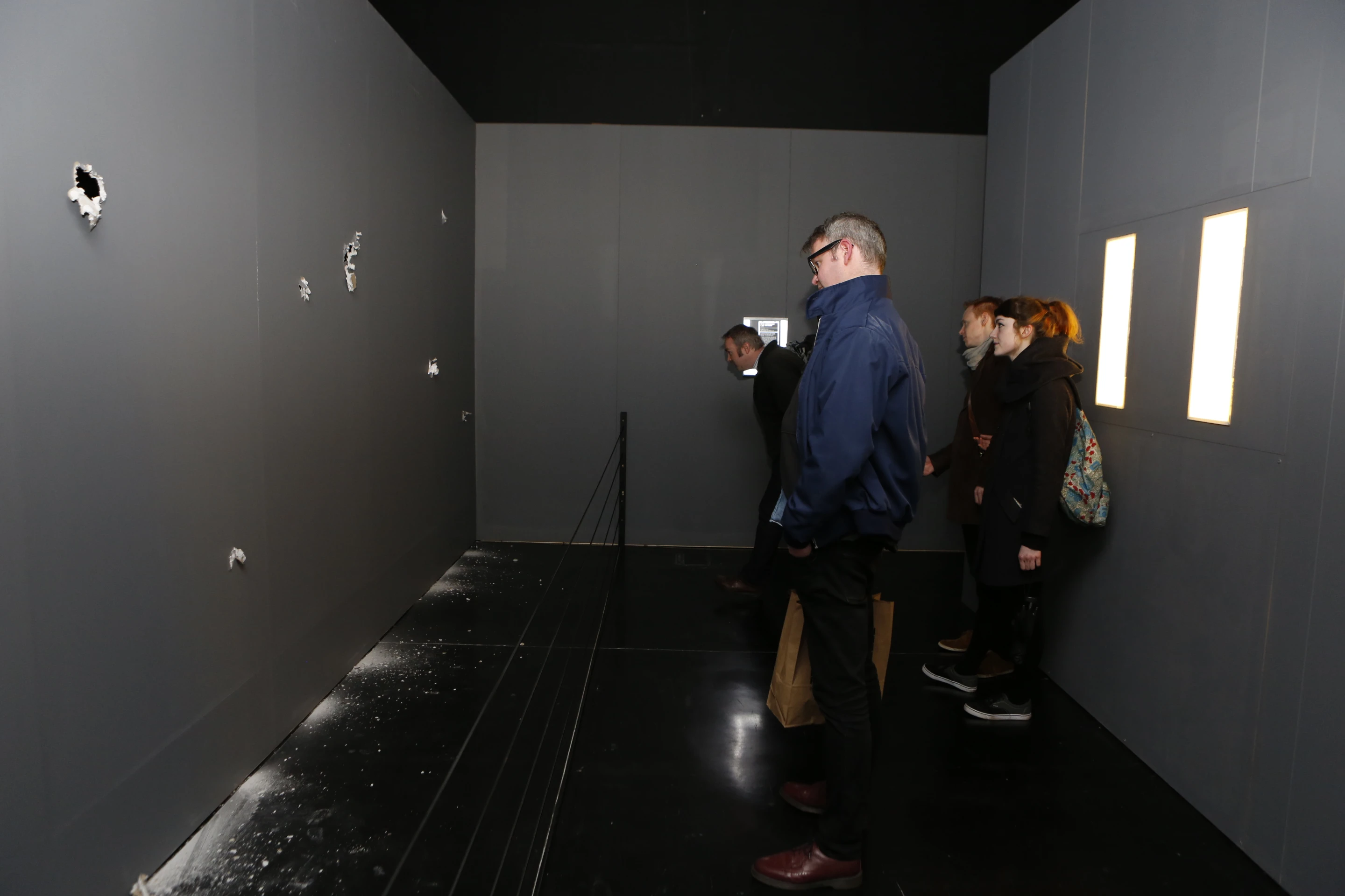 The robots react to audience members and so the work is influenced by what they see